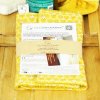 Lot de 2 serviettes visage en coton et micro-éponge bambou OEKO-TEX Jaune Curcuma Riad. +/- 21 cm de côté.